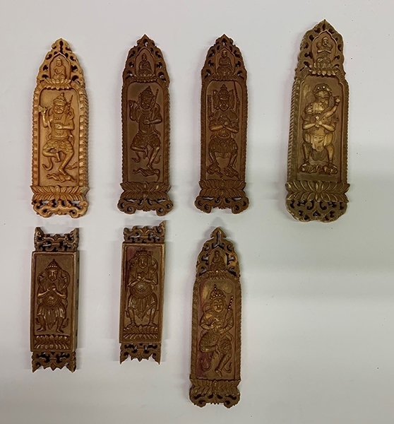 木雕牌飾（暫定名）。國(guó)家文物局供圖