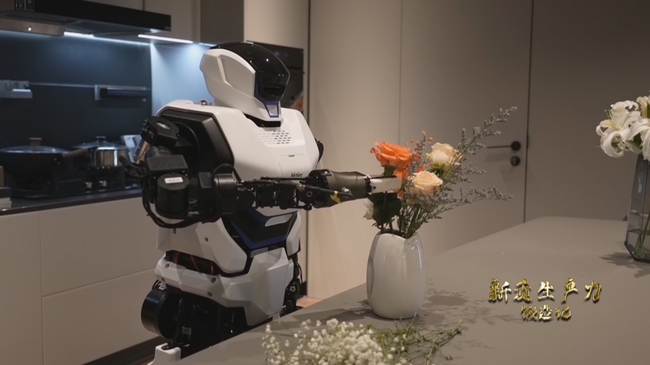 人形機(jī)器人插花。