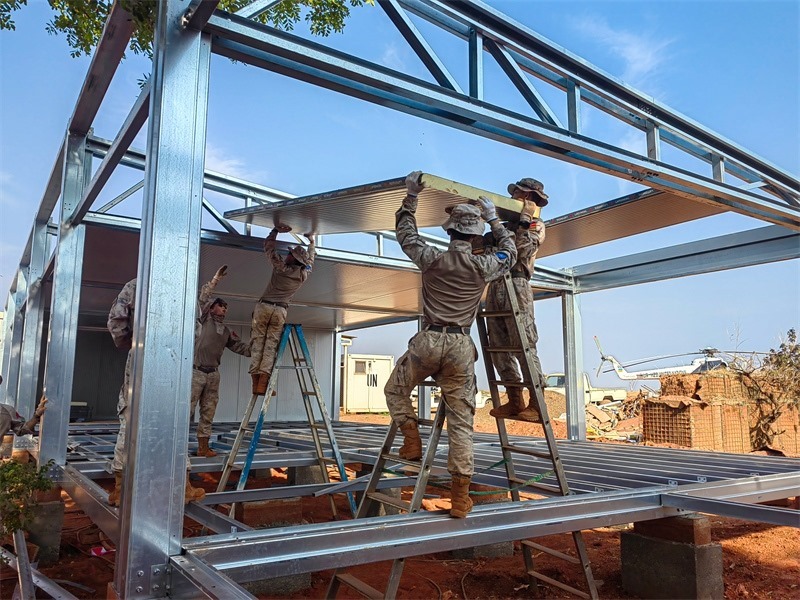 小組協(xié)同推進工程任務。鄧原淘攝